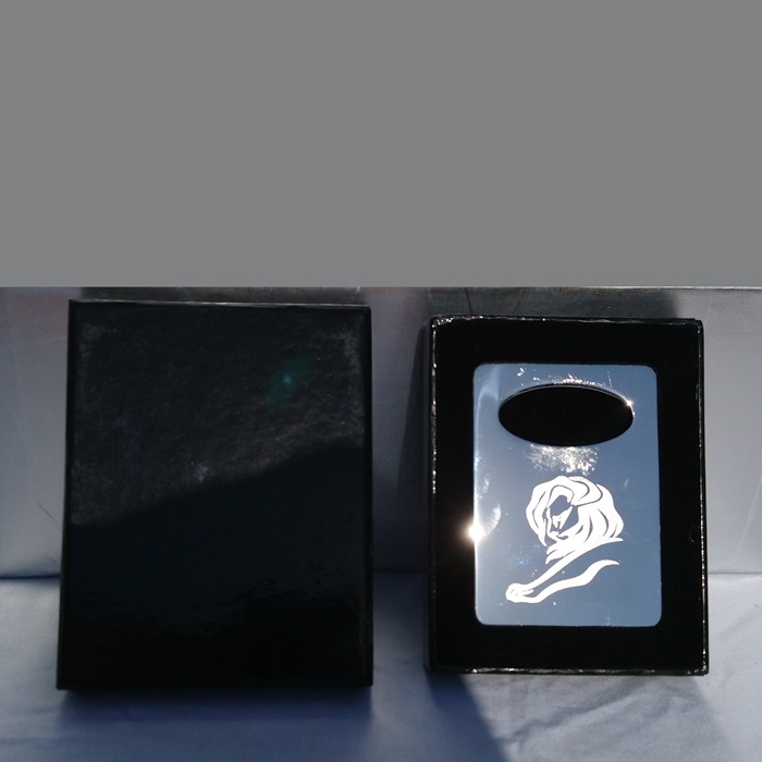 Décapsuleur de bouteille argenté tête de lion du Festival International du Film Publicitaire de Cannes - Silver bottle opener with lion head from the Cannes International Advertising Film Festival