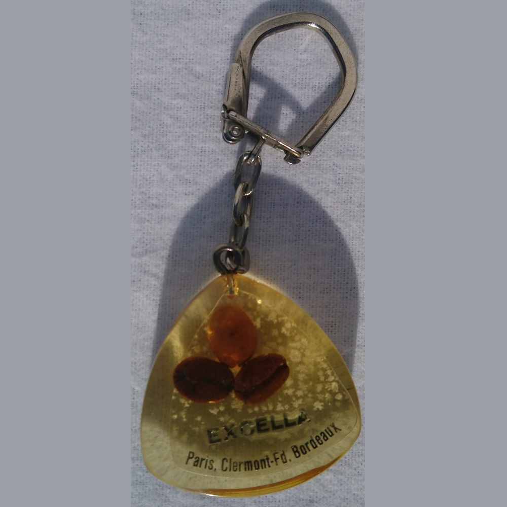 Porte-clefs publicitaire café Excella avec 3 grains de café vitrifiés des années 50 - Excella coffee promotional keychain with 3 vitrified coffee beans from the 1950s